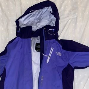 purple north face raincoat